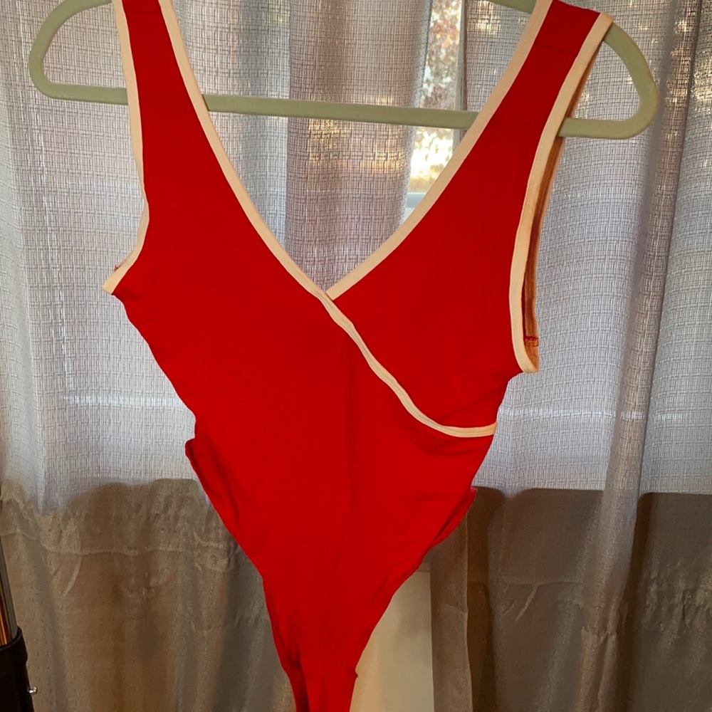 Red and white bodysuit